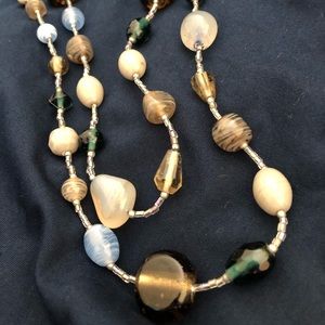 Blue tan and silver beaded necklace and earrings